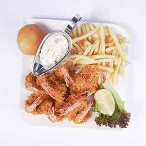 Overhead flat-lay shot of a luxurious tempura shrimp platter, featuring crispy golden shrimp, golden fries, soft buns, a silver boat of creamy tartar sauce, lemon wedges, and lettuce on a white plate.