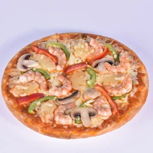 A top view of a delicious shrimp pizza topped with mushrooms, red and green peppers, and pineapple slices on a white plate.