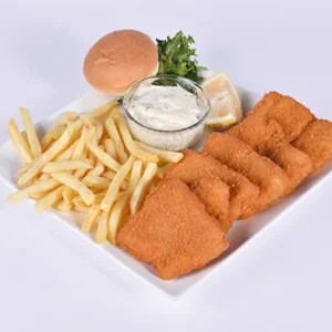 A white square plate with crispy golden chicken fillets, a pile of french fries, a soft burger bun, a bowl of creamy garlic dip, lemon wedge, and fresh lettuce.