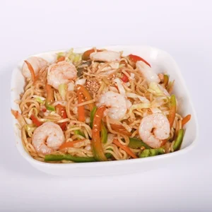 A white bowl filled with stir-fried noodles, featuring shrimp, carrots, and bell peppers on a white background.