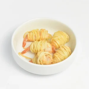 A white bowl filled with golden fried potato-wrapped shrimp, styled as a crispy appetizer on a white background.